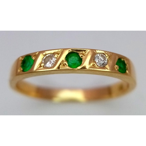 68 - A 18K YELLOW GOLD DIAMOND & EMERALD BAND RING 4.5G SIZE V.

SC 1088