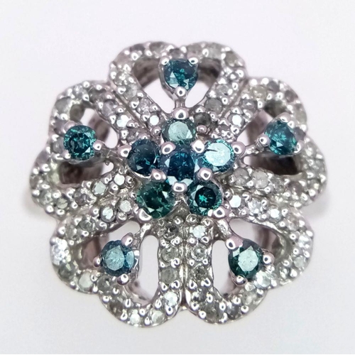 75 - A 9K WHITE GOLD BLUE AND WHITE DIAMOND SET FANCY FLOWER CLUSTER RING 0.50CT 6G.

ref: 2775