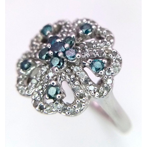 75 - A 9K WHITE GOLD BLUE AND WHITE DIAMOND SET FANCY FLOWER CLUSTER RING 0.50CT 6G.

ref: 2775