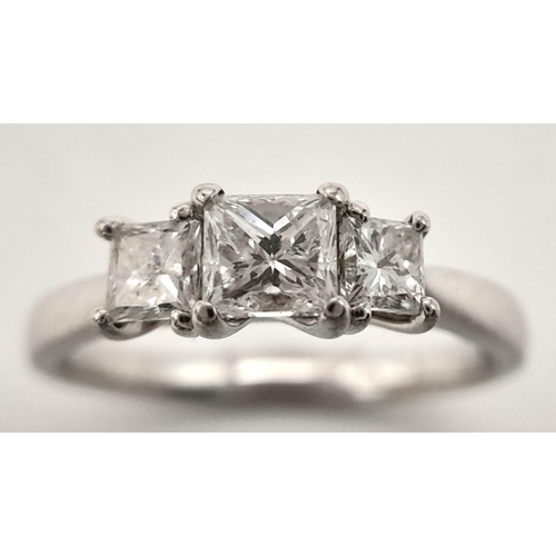 82 - AN 18K WHITE GOLD DIAMOND 3 STONE RING - 0.80CT. 3.2G. SIZE K