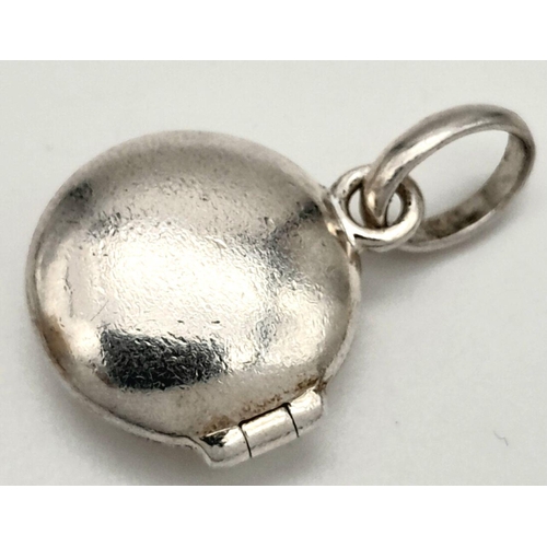 839 - LINKS OF LONDON STERLING SILVER LOCKET ENGRAVED WITH THE WORDS BUN IN THE OVEN WHICH OPENS TO REVEAL... 