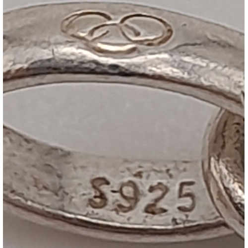 839 - LINKS OF LONDON STERLING SILVER LOCKET ENGRAVED WITH THE WORDS BUN IN THE OVEN WHICH OPENS TO REVEAL... 