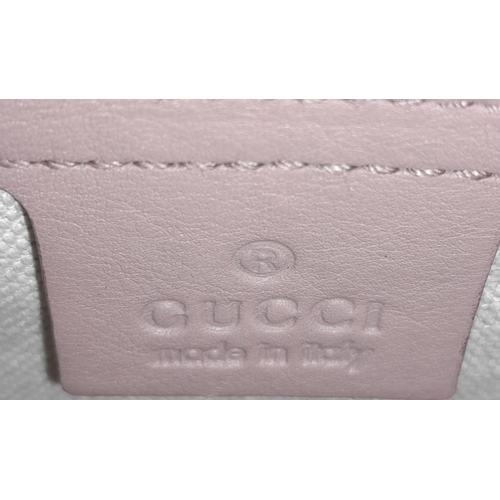 157 - A Gucci Dusty Pink Monogram Nice Dome Bag. Patent leather exterior with gold-toned hardware, two-ton... 