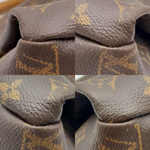 171 - A Brown Louis Vuitton Artsy MM Monogram shoulder bag. Leather exterior with signature Monogram canva... 