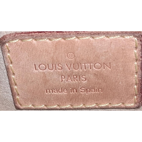 171 - A Brown Louis Vuitton Artsy MM Monogram shoulder bag. Leather exterior with signature Monogram canva... 