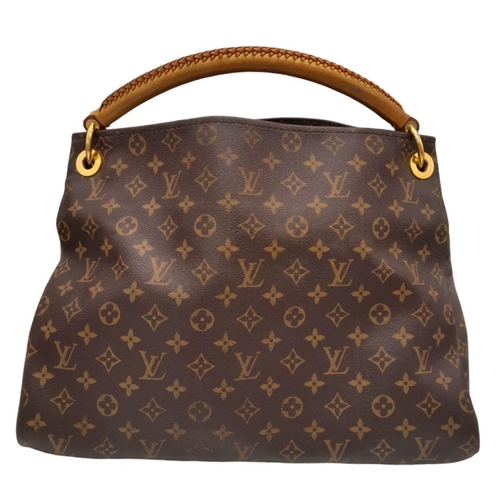 171 - A Brown Louis Vuitton Artsy MM Monogram shoulder bag. Leather exterior with signature Monogram canva... 