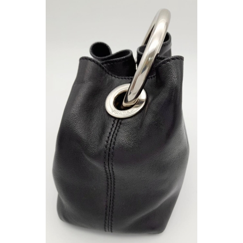 178 - A Prada Wrist Mini Leather Ring Handle Bag. Black nappa leather with maxi ring-shaped handle in silv... 