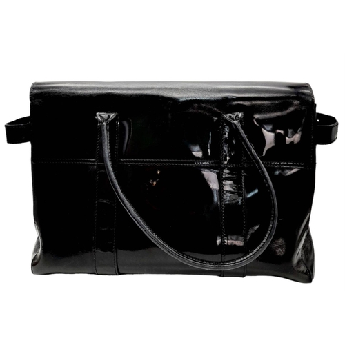 303 - A Black Mulberry Bayswater Handbag. Gloss Leather exterior with gold-tone hardware, double rounded t... 