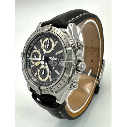 39 - A BREITLING CHRONOMETRE AUTOMTIC GENTS WATCH IN STAINLESS STEEL WITH BLACK LEATHER STRAP, 3 SUBDIALS... 