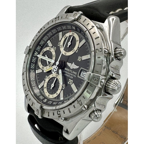 39 - A BREITLING CHRONOMETRE AUTOMTIC GENTS WATCH IN STAINLESS STEEL WITH BLACK LEATHER STRAP, 3 SUBDIALS... 