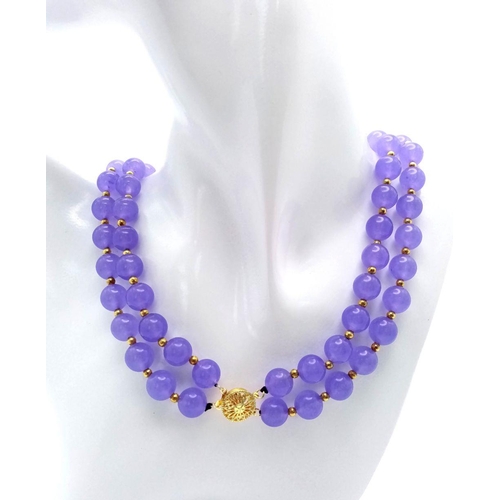 438 - A Gorgeous Lavender Jade Two Row Beaded Necklace. 10mm beads with gilded spacers and clasp. 44cm nec... 