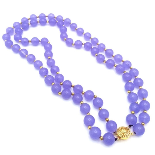 438 - A Gorgeous Lavender Jade Two Row Beaded Necklace. 10mm beads with gilded spacers and clasp. 44cm nec... 