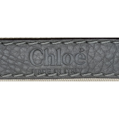 486 - A Dark Grey Chloe 'Paddington' Handbag. Leather exterior with silver-tone hardware, double rolled to... 