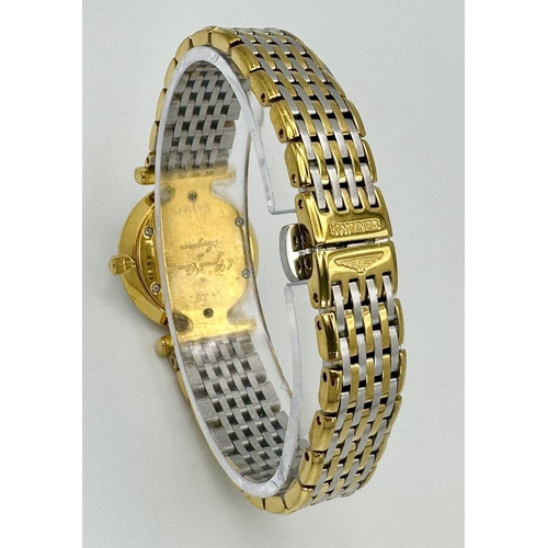 74 - A LADIES LONGINE BI-METAL WATCH WITH DIAMOND NUMERALS ON A MOTHER OF PEARL DIAL, MANUAL MOVEMENT IN ... 