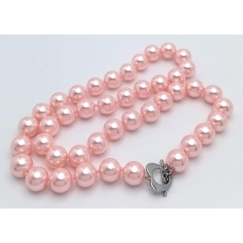 768 - A Chic Pink South Sea Pearl Shell Beaded Necklace. 12mm beads. 48cm necklace length.