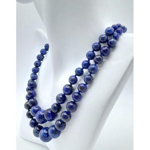 885 - A Two Row Lapis Lazuli Graduated Beaded Necklace. 42-44cm.