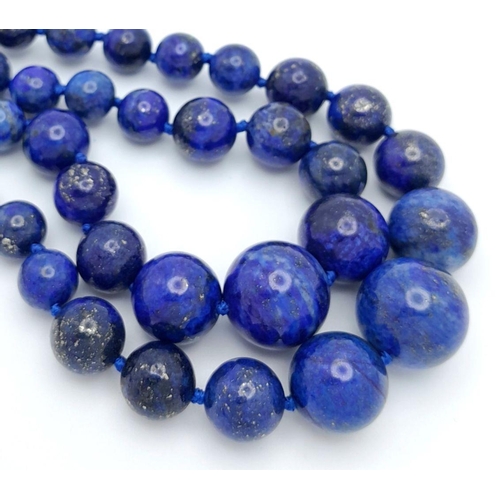 885 - A Two Row Lapis Lazuli Graduated Beaded Necklace. 42-44cm.