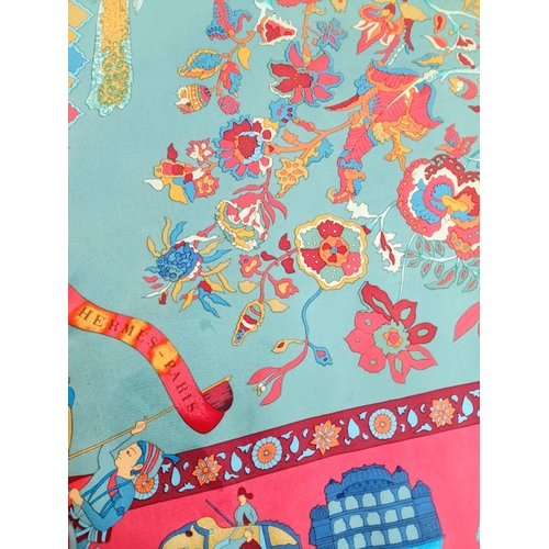 185 - A Hermes 'Fantaisies Indiennes' Scarf, featuring vibrant Indian-inspired motifs of musicians, dancer... 