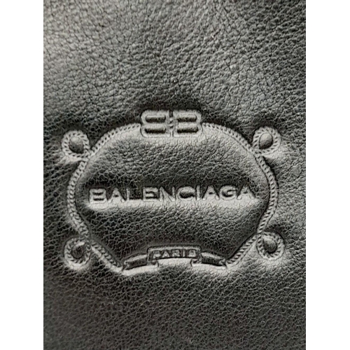 284 - A Vintage Balenciaga shoulder bag. Black leather exterior, white contrast stitching that highlights ... 