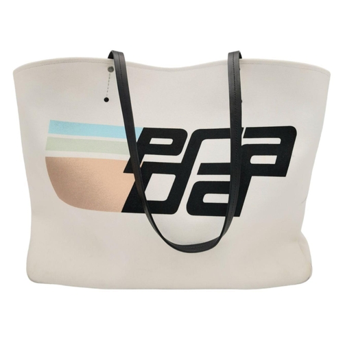 288 - A Prada Canapa Racing Logo Tote Bag. White Canvas exterior with a printed Prada logo on the front, f... 