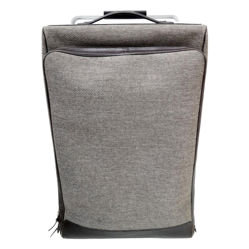 31 - A Grey Hermes 'Caleche-Express' Rolling Luggage. Canvas exterior with dark brown leather trim, front... 