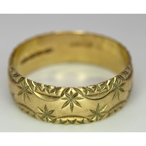 100 - a 9k gold patterned band ring .    2.5gms    size Q