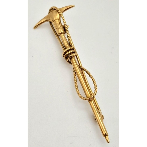 112 - A vintage, Swiss, 10 K yellow gold Mountaineering Ice Axe and Rope brooch. Traditionally these brooc... 