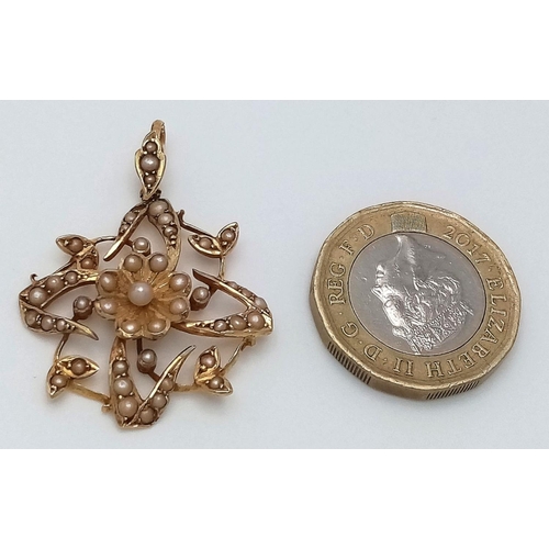 121 - A VICTORIAN 18K GOLD PENDANT WITH SEED PEARL DECORATION .   3.9gms