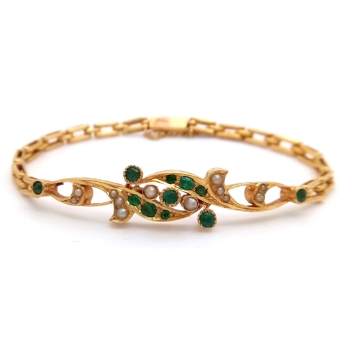 43 - An 18K Yellow Gold (tested) Emerald and Pearl Bracelet. Rich green emeralds and seed pearls in a rev... 