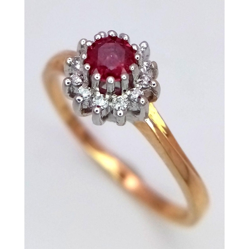 744 - A 9K YELLOW GOLD DIAMOND & RUBY CLUSTER RING. 2.4G. SIZE Q