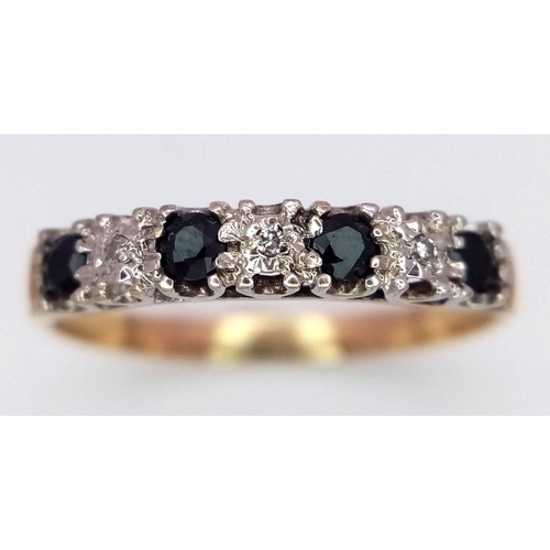 765 - A 9K YELLOW GOLD ( TESTED ) DIAMOND & SAPPHIRE RING. 1.5G. SIZE T.