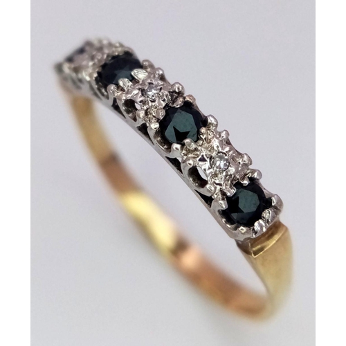 765 - A 9K YELLOW GOLD ( TESTED ) DIAMOND & SAPPHIRE RING. 1.5G. SIZE T.