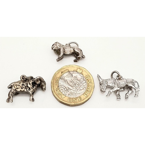 776 - 3 X STERLING SILVER CHARMS TO INCLUDE: RAM, DONKEY & LION 12.6G.

SC 1070