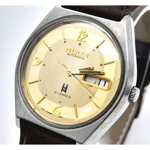 899 - A Vintage Allwyn Automatic Gents Watch. Brown leather strap. Stainless steel case - 36mm. Yellow dia... 