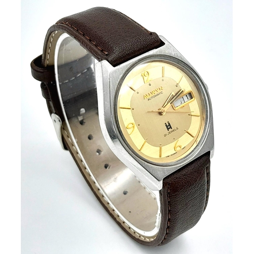 899 - A Vintage Allwyn Automatic Gents Watch. Brown leather strap. Stainless steel case - 36mm. Yellow dia... 