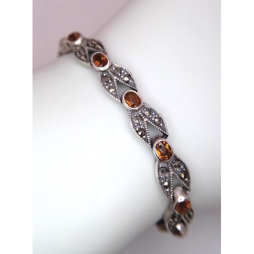 906 - A Marcasite and Citrine Bracelet. White metal, boxed. 18cm