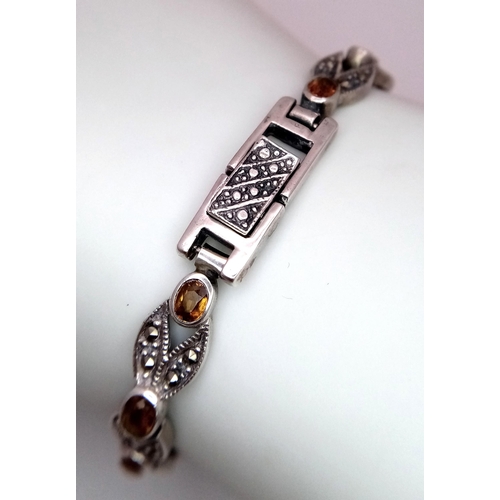 906 - A Marcasite and Citrine Bracelet. White metal, boxed. 18cm