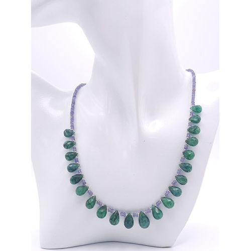 901 - A 125ctw Tanzanite Gemstone Single Strand Necklace with Emerald Drops. 925 Silver Clasp. 42cm. Ref: ... 