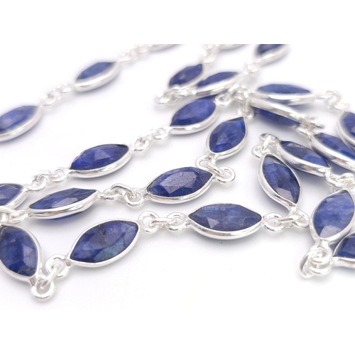 660 - A Marquise Shape Blue Sapphire Long Chain Necklace. Set in 925 Silver. 62cm. Ref: CD-1318