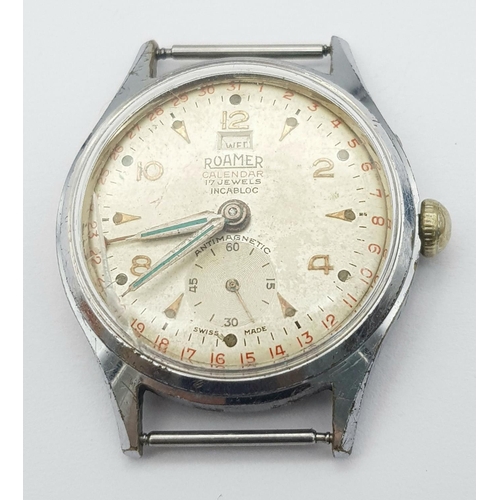 739 - A Vintage Roamer Calendar 17 Jewels Stainless Steel Watch Case -33mm. Patinaed dial with sub dial. M... 