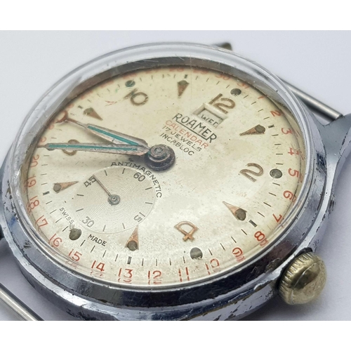 739 - A Vintage Roamer Calendar 17 Jewels Stainless Steel Watch Case -33mm. Patinaed dial with sub dial. M... 