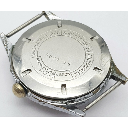 739 - A Vintage Roamer Calendar 17 Jewels Stainless Steel Watch Case -33mm. Patinaed dial with sub dial. M... 