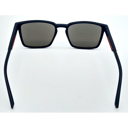 773 - A Pair of Designer Tommy Hilfiger Sunglasses.