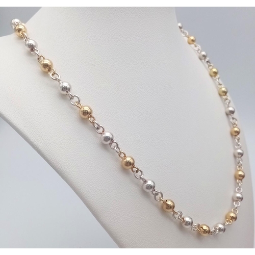 836 - A 925 Silver and Gilded Bauble Necklace - 44cm. 19.5g