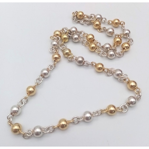 836 - A 925 Silver and Gilded Bauble Necklace - 44cm. 19.5g