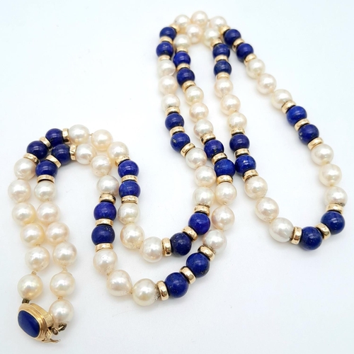 838 - A Lapis and Pearl Necklace with 14K Gold Spacers and Clasp. 
68cm