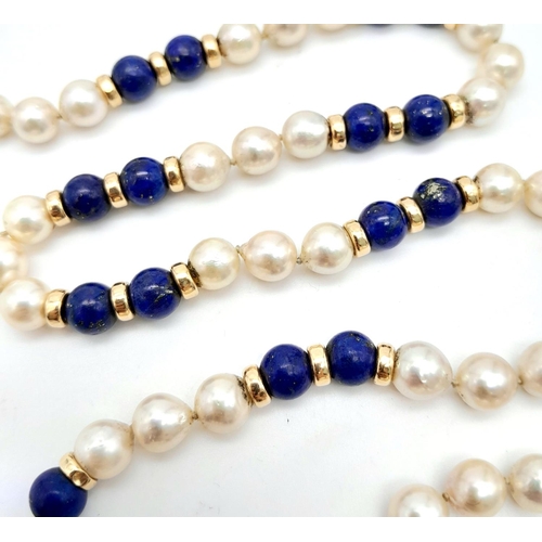 838 - A Lapis and Pearl Necklace with 14K Gold Spacers and Clasp. 
68cm