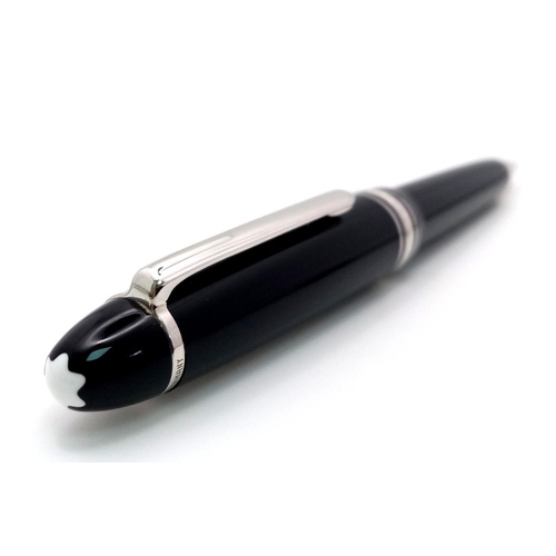 859 - A Montblanc Meisterstuck Black Lacquered Ballpoint Pen. 15cm