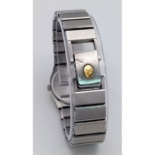 865 - A Concord Quartz Ladies Watch. Stainless steel bracelet and case - 24mm. Black dial. In working orde... 