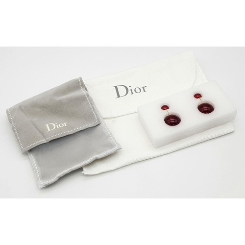 851 - A Pair of Dior Cherry Red Orb Earrings. Comes in Dior packaging.